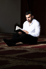 Muslim Man Reading Holy Islamic Book Koran
