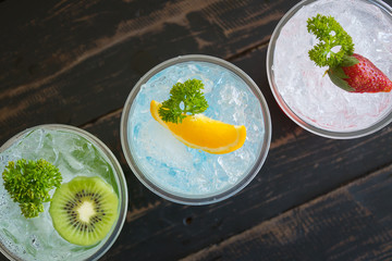 Green Blue Red Italian Soda Cold Beverage and Kiwi Lemon Strawberry Fruit