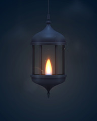 Vintage dark blue lantern with a burning realistic fire