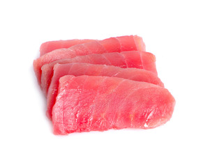 Slices of raw tuna fish meat on white background