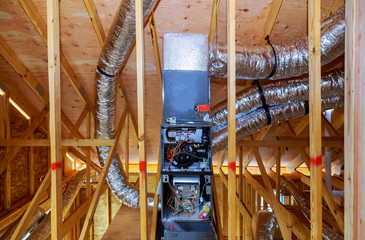 installation of heating system on the roof of the pipe system of heating closeup