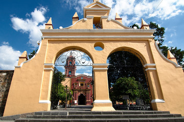 Entrance to Santa María Tonantzintla church, one of the many churches for which this town is famous. Cholula, Puebla, Mexico.