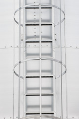 Ladder on silo for storage grain after harvest, detail of agricultural equipments