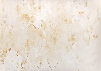abstract beige watercolor wash background on textured paper