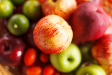 Fresh fruits and vegetables on wooden table.