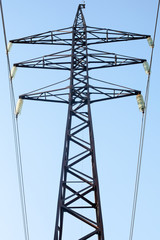power line pole with cables and wire black silhouette on sky background front view