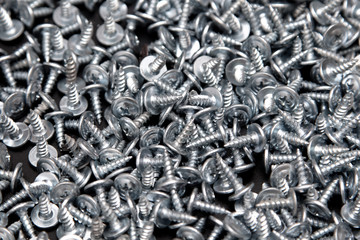 Sharp screws as abstract background