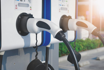 Electric vehicle charging (Ev) station with plug of power cable supply for Ev car. payment NFC....