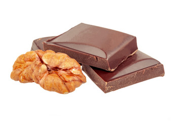 dark chocolate bar with walnuts on a white background