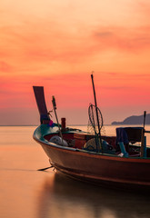 Long tail boat at sunset in Thailand