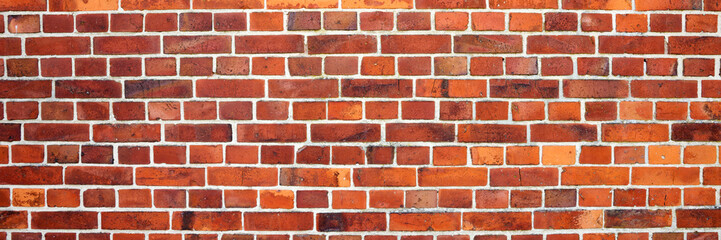Panoramic image of red brick wall. Texture of red brick wall. Background of red brick wall