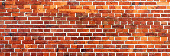 Panoramic image of red brick wall. Texture of red brick wall. Background of red brick wall