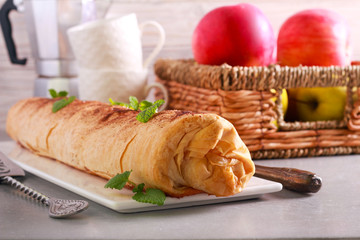 Spice apple strudel, sliced and served