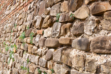 Italian ancient house: typical stone wall
