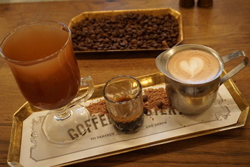 Boutique Artisan traditional coffee and arabica coffee beans at a cafe served in a tray with hot chocolate delicious aroma