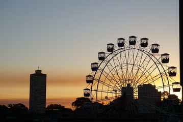 ferris wheel at night and sunset