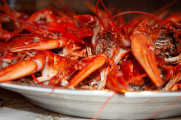 Bokeh with boiled crayfish on the table