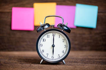 alarm clock with paper note background