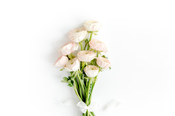 Naklejka na ściany i meble Bouquet of pink ranunculus flower close up. Flat lay, top view. Ranunculus flower texture.
