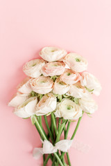Bouquet of pink ranunculus flower close up. Flat lay, top view. Ranunculus flower texture.