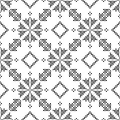 Cross-stitch. Black and white seamless decorative pattern. Ornamented background for design, wallpaper, textile.