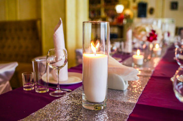 beautiful candles on a table in a restaurant.