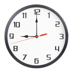 Wall clock isolated on white background. 9 p.m. or 9 a.m.