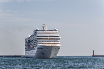 CRUISE SHIP - A beautiful passenger ship maneuvers in the port of Gdynia