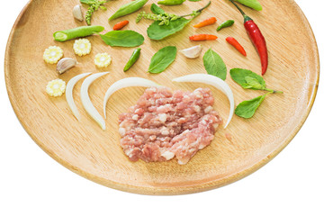 Ingredient of Fried stir basil with minced pork on Wood tray isolated on white background, selective focus (detailed close-up shot)