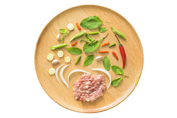 Ingredient of Fried stir basil with minced pork on Wood tray isolated on white background, selective focus (detailed close-up shot)