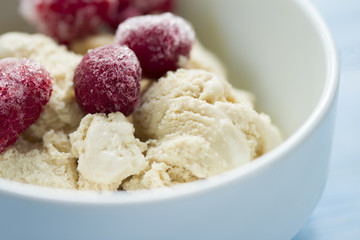  homemade ice cream with frozen cherry and raspberry .   healthy sweets concept