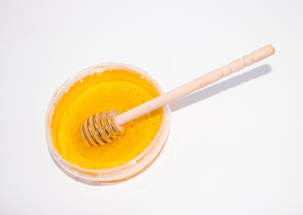 clear plastic jar with pasta for hair removal