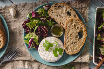 Grilled camembert cheese with honey