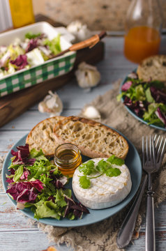 Grilled camembert cheese with honey