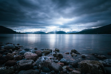 Mystic landscape lake scenery in Scotland: Cloudy sky, sunbeams and mountain range in loch Linnhe - 264735048