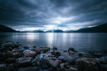 Fotobehang Slaapkamer Mystic landscape lake scenery in Scotland: Cloudy sky, sunbeams and mountain range in loch Linnhe  © Patrick Daxenbichler