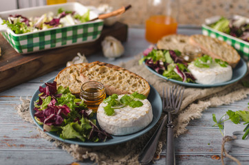 Grilled camembert cheese with honey