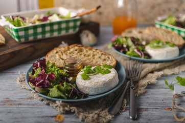 Grilled camembert cheese with honey