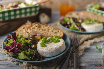 Grilled camembert cheese with honey