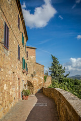 Fototapeta na wymiar Beautiful street of the ancient town of Pienza in Tuscany. Italy