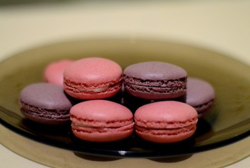 colorful macaroons on wooden table