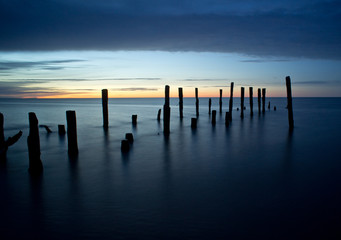 Old harbor ruins in Kuldiga. Peaceful blue sea and port. Harbour in Baltic sea, Latvia, Europe