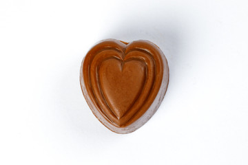 Chocolate truffle hart square cube rose flower shape on white background