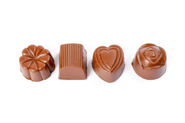 Chocolate truffle hart square cube rose flower shape on white background