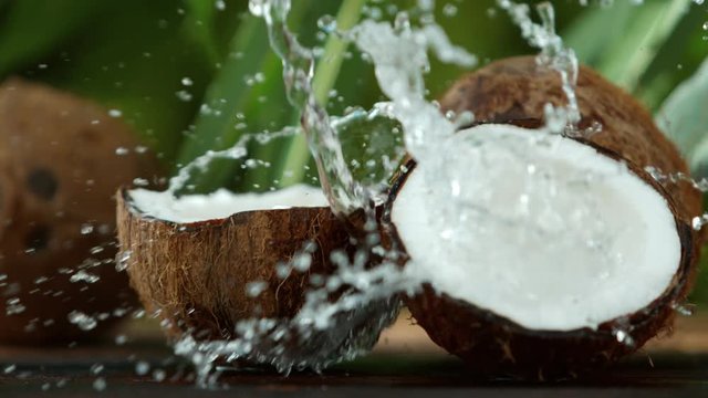 Super slow motion of coconut with splash. Filmed on high speed cinema camera, 1000 fps.