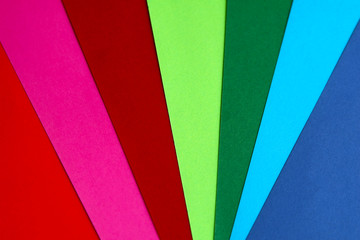 Geometric composition of several bright color sheets of paper. Suitable background for your design, presentation, brochure, web, banner, catalog, poster, book, magazine