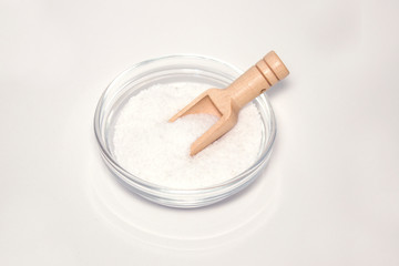 salt on a wooden spoon