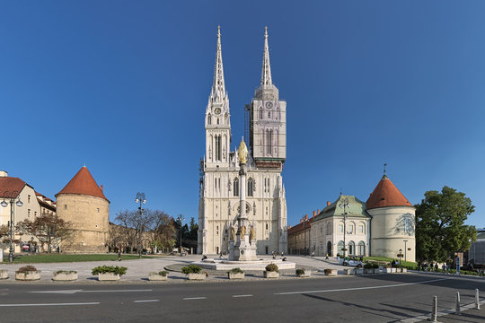 Zagreb, Croatia. Cathedral and Kaptol square with fountain of Blessed Virgin Mary in sunny clear day.