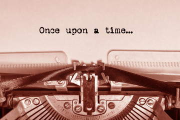 once upon a time... printed on paper on a vintage typewriter. writer, journalist.