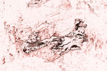 Vintage pink background. Rough painted wall of living coral color. Imperfect plane of beige colored. Uneven old decorative toned backdrop of beige tint. Texture of pink hue. Ornamental stony surface.